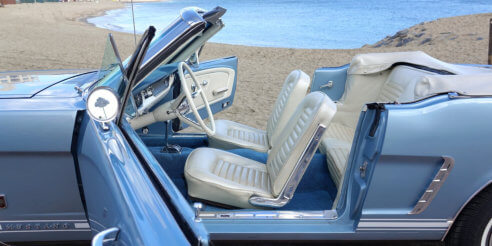 1965 Ford Mustang interior with new carpet and floor mats